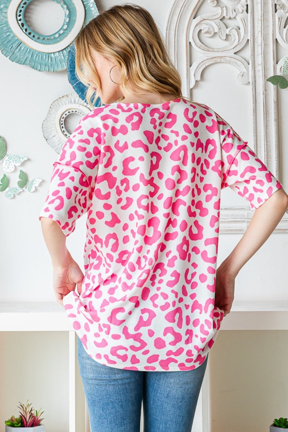 Heimish Full Size Leopard Exposed Seam Short Sleeve Top *